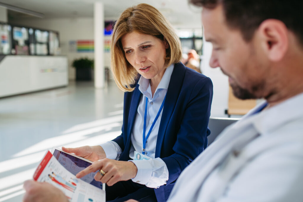 SCRC representative assisting a homeowner in reviewing their solar agreement.