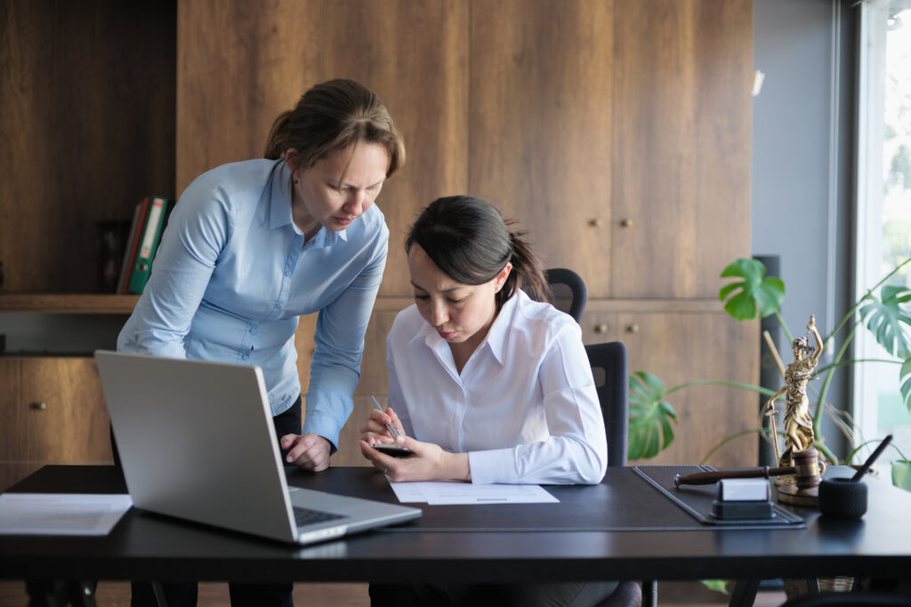 Homeowners looking over their solar contract before calling Solar Cancellation Resource Center for help cancelling their solar contract. 
