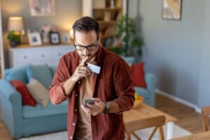 A homeowner getting ready to call Solar Cancellation Resource Center to help get him out of his solar contract and discuss his options.