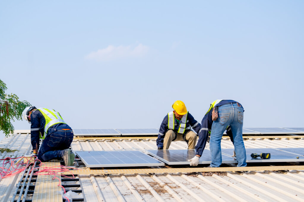 Solar panels being removed after SCRC and CALG helped a homeowner out of their contract. 