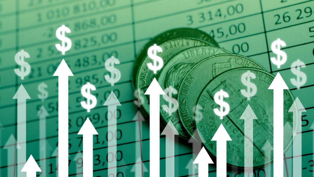 A green grid matrix paper showing white arrows pointing dramatically upward, overlaid with several silver liberty dollar coins standing in a row.